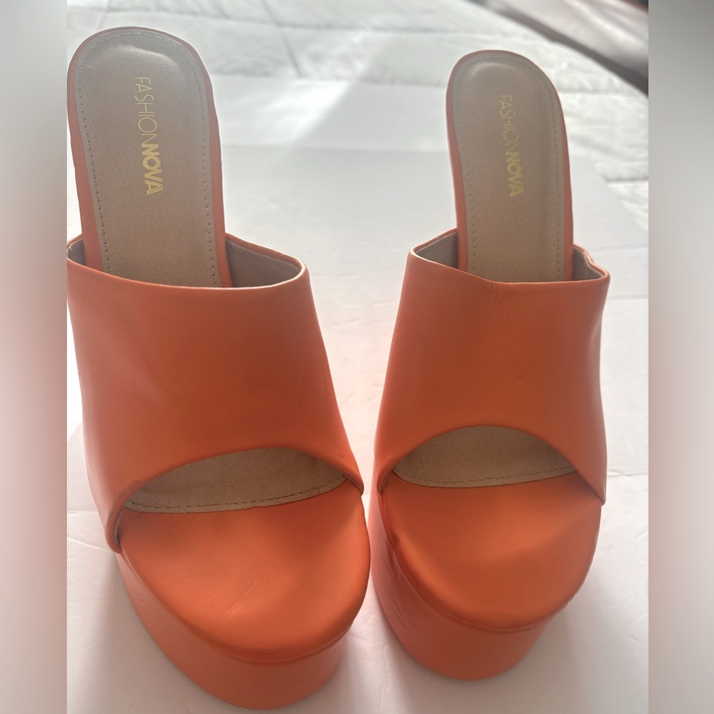 Fashion Nova| Fashion Nova slip on orange platform heels. Size 9